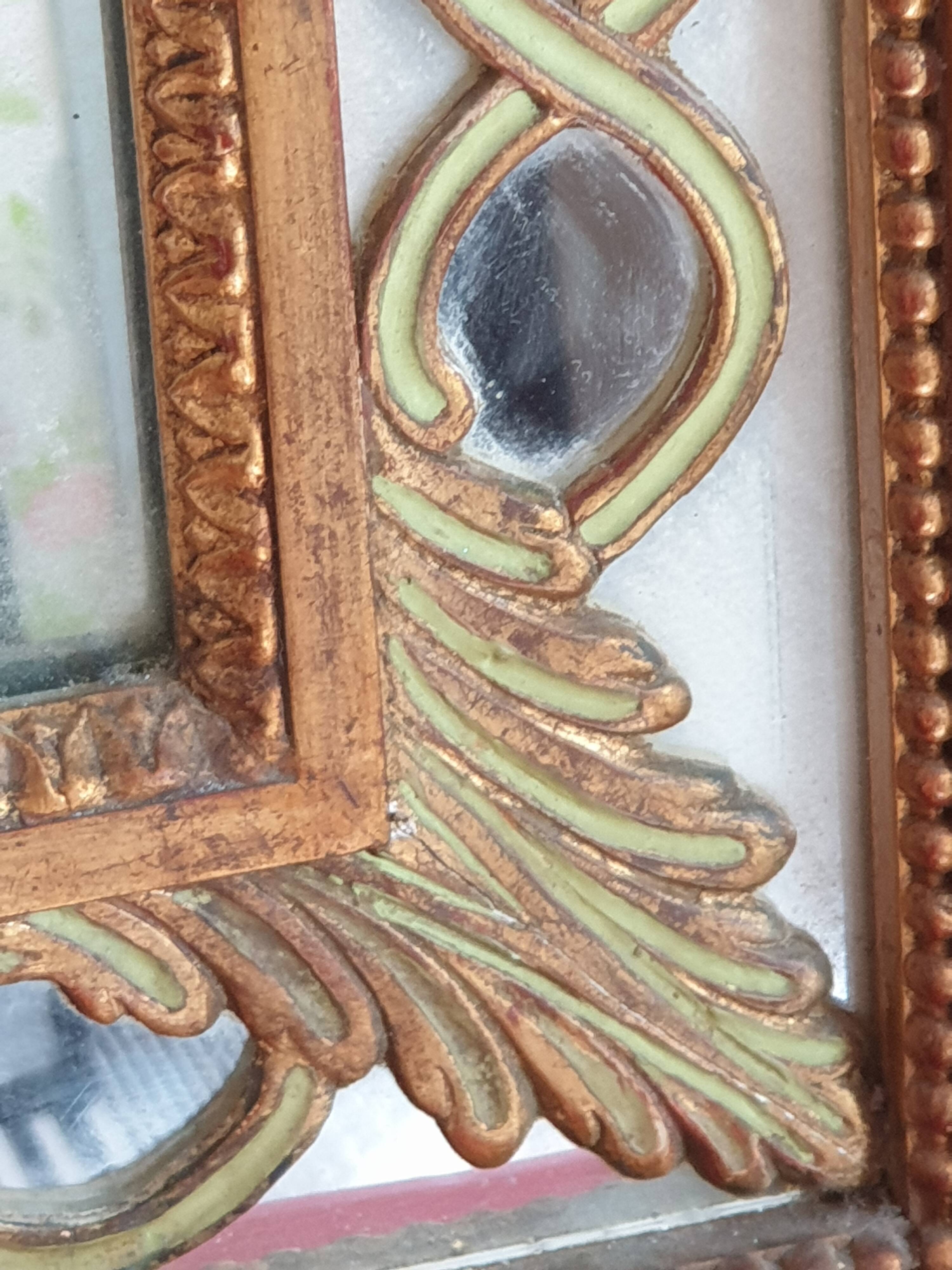 Classic antique mirror in gilded wood