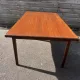 Rectangular extendable table in Scandinavian style made of teak.