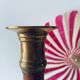 Old candle holder in brass and wood