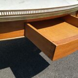 Oval marble and wood coffee table