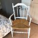 Fauteuil blanc assise paillée
