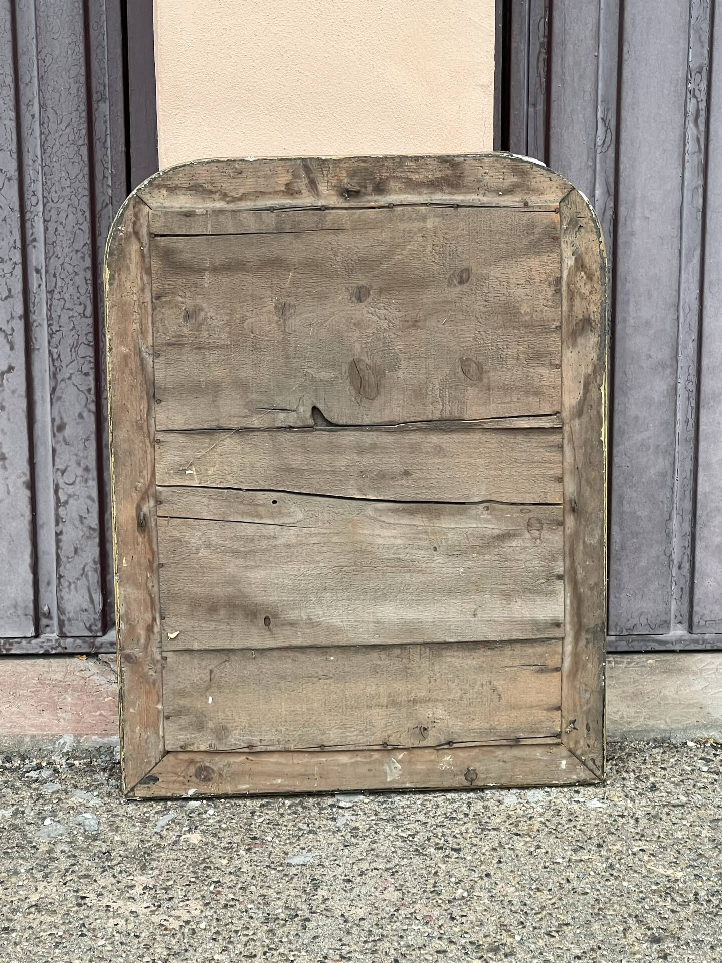 Louis Philippe mirror in gilded wood with an openwork frieze and mercury glass.
