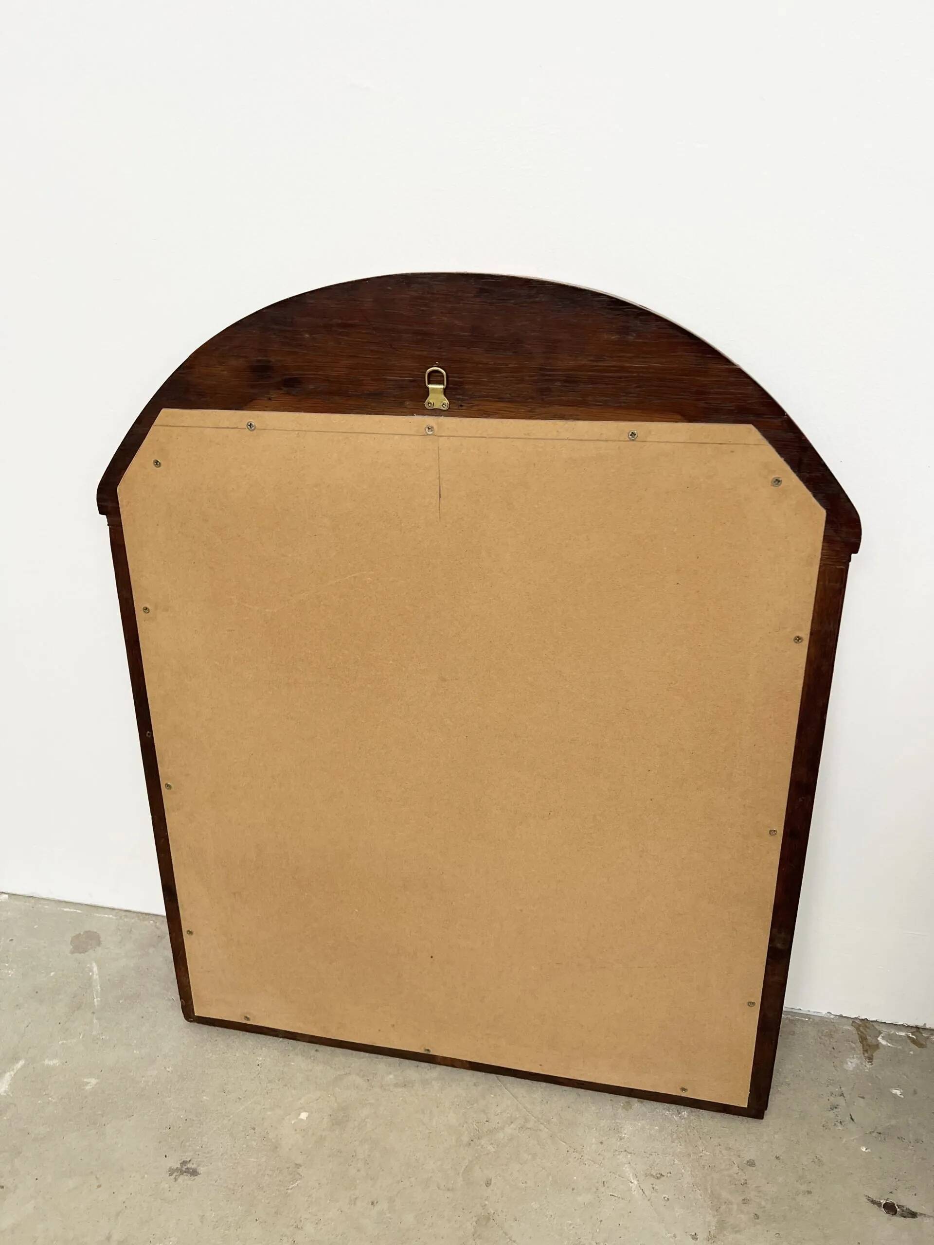 Art Deco oak mirror with carved motif