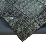 Hand-knotted turkish vintage 172 cm x 243 cm black patchwork rug