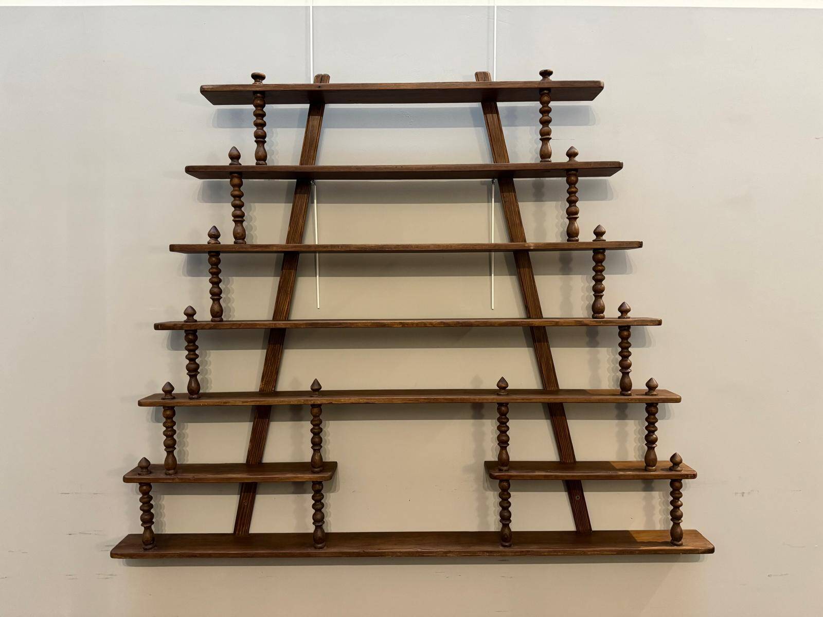 Turned wood bar wall shelf