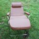 Old chaise longue in faux leather skai lama