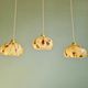 Trio of Art Deco pendant lights in marbled opaline glass, 1920s-30s
