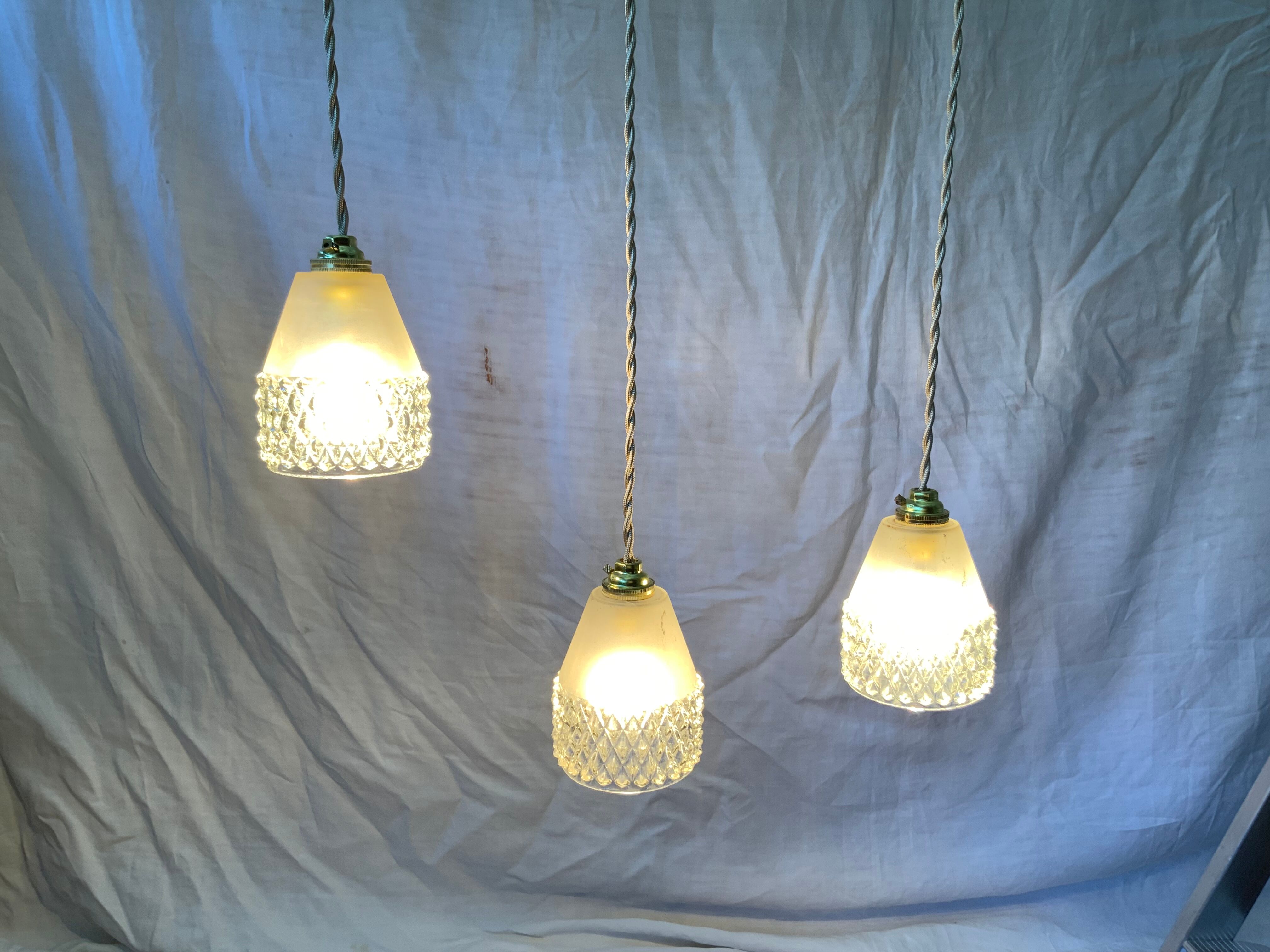 Trio of vintage suspensions