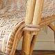 High-backed adult rattan armchair, circa 1960