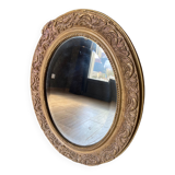 Old beveled oval mirror