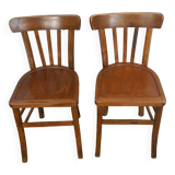 pair of vintage wooden bistro chairs