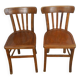 pair of vintage wooden bistro chairs