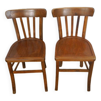 pair of vintage wooden bistro chairs