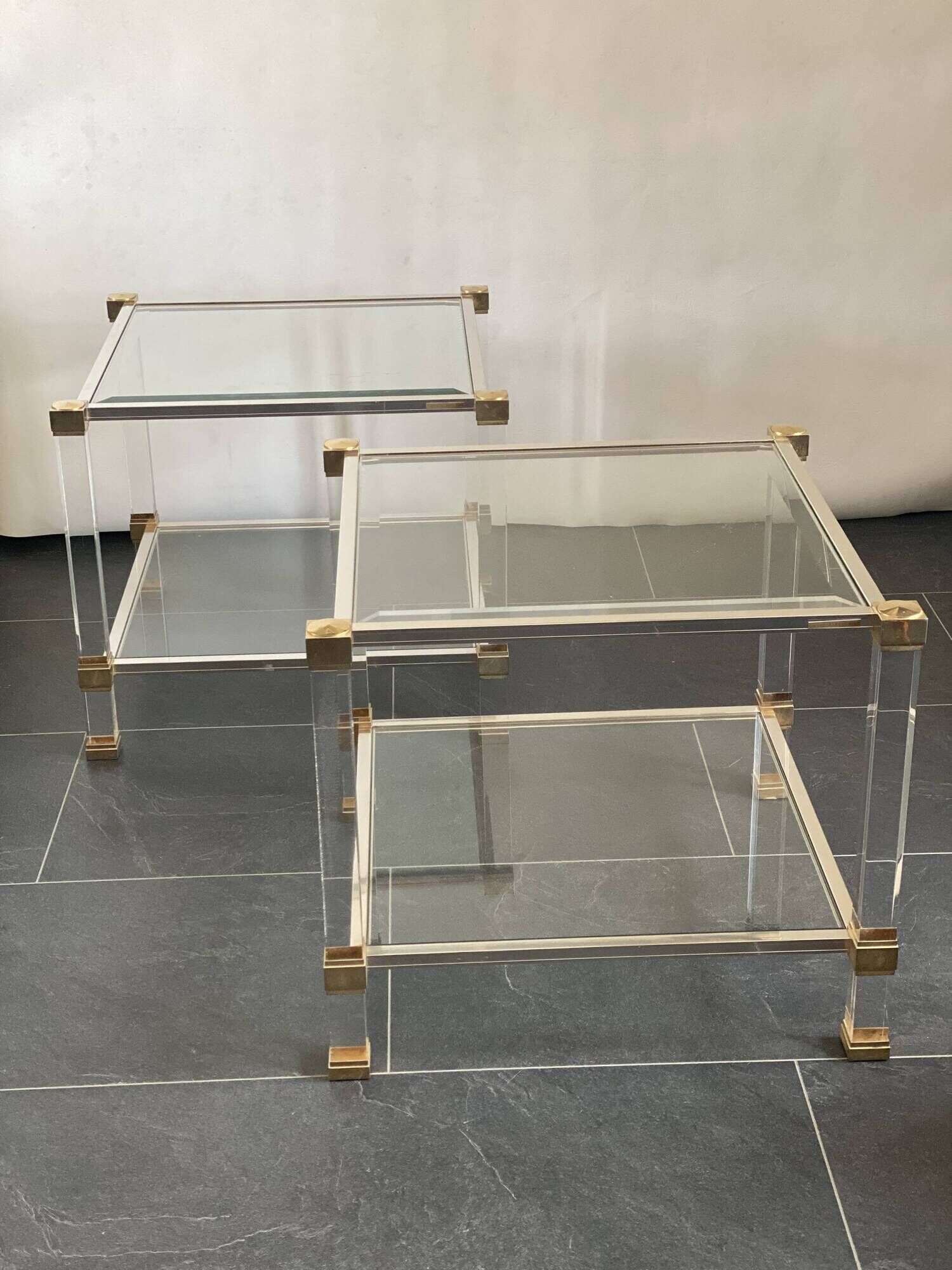 Pair of vintage and brass glass hollywood regency side tables by peter vandel