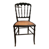 Cane chair in turned and blackened wood