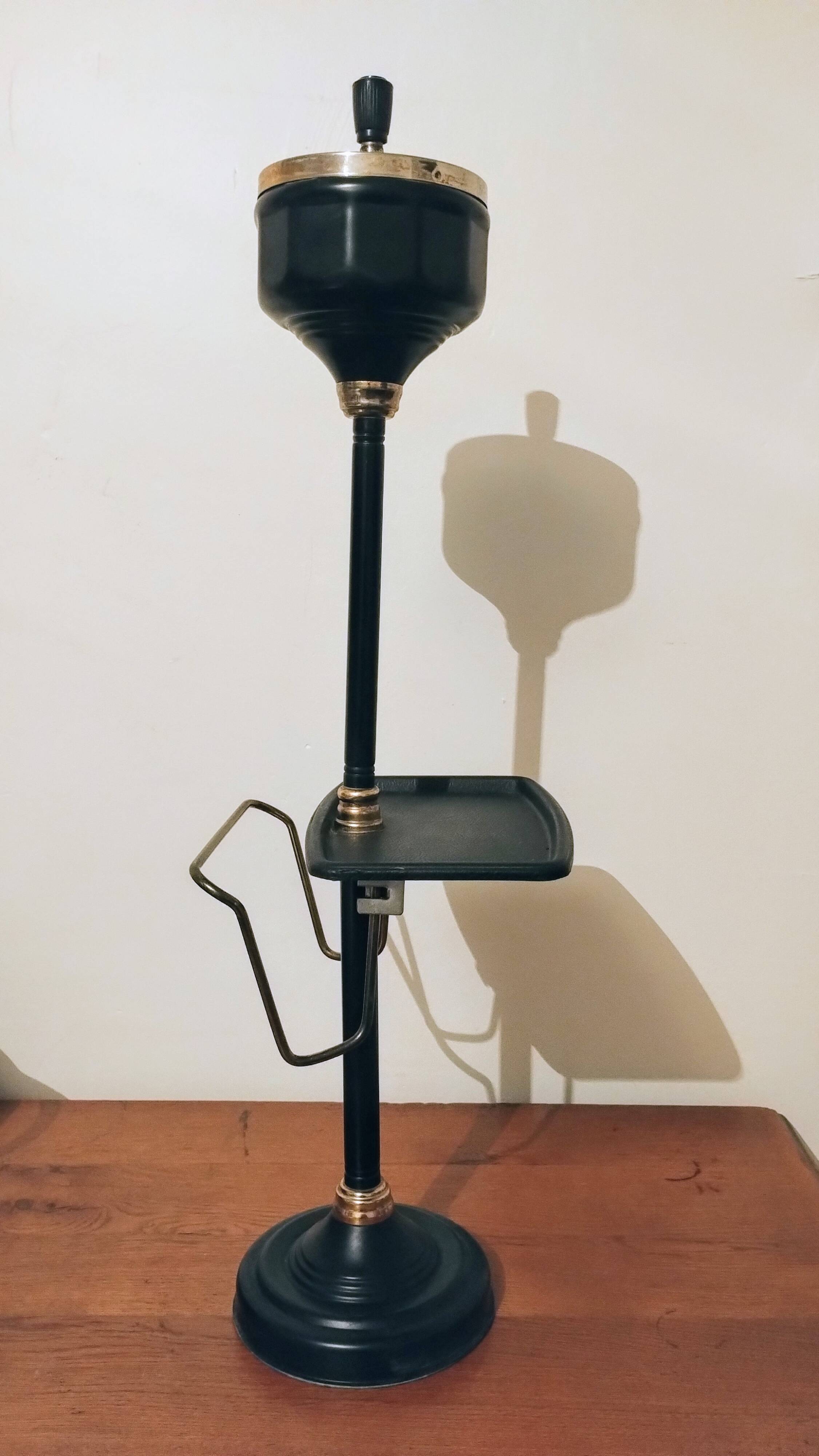 Black and gold ashtray magazine holder, mid-20th century