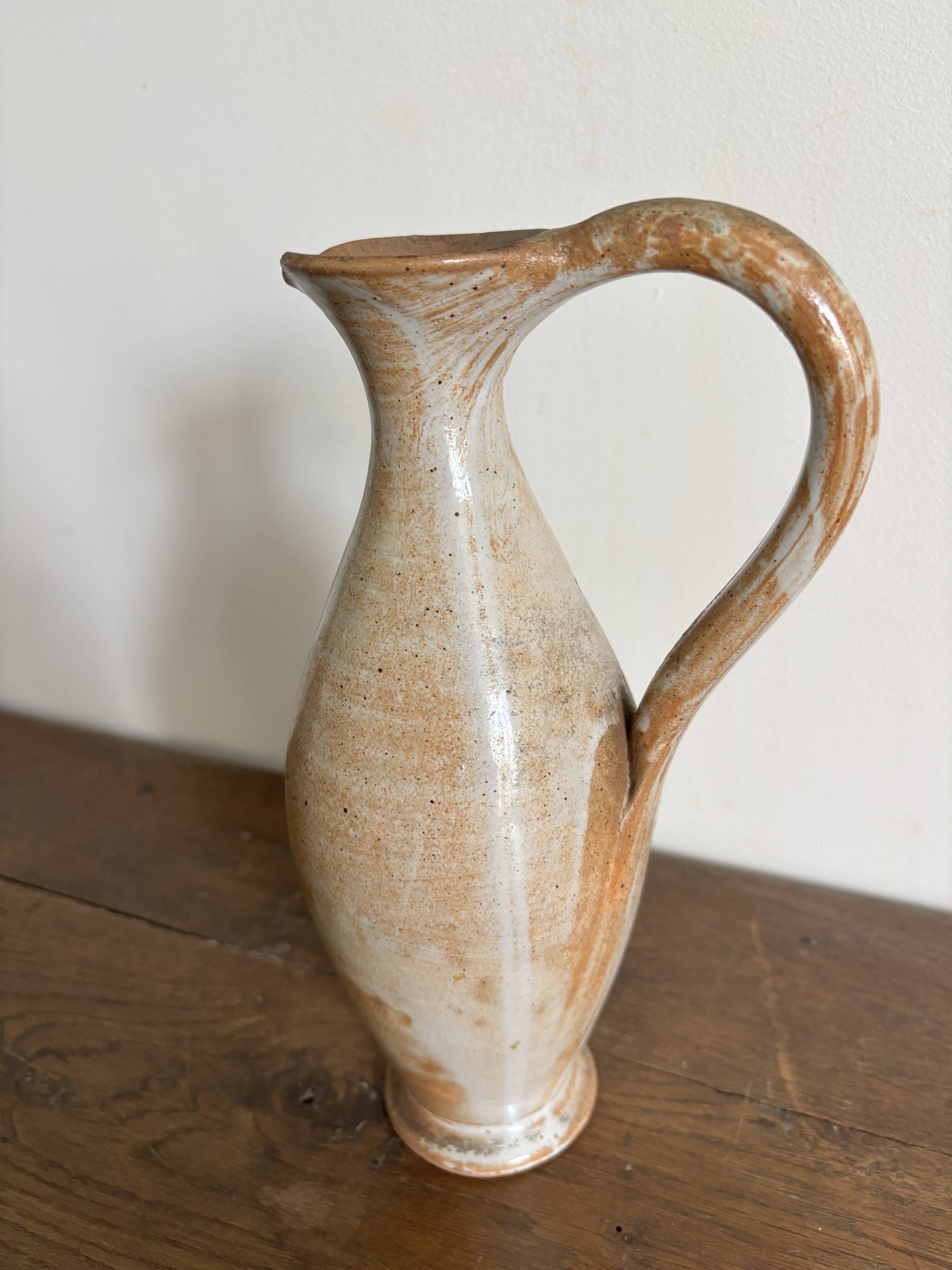 Handcrafted stoneware vase, a vintage piece from the 1960s.