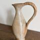 Handcrafted stoneware vase, a vintage piece from the 1960s.