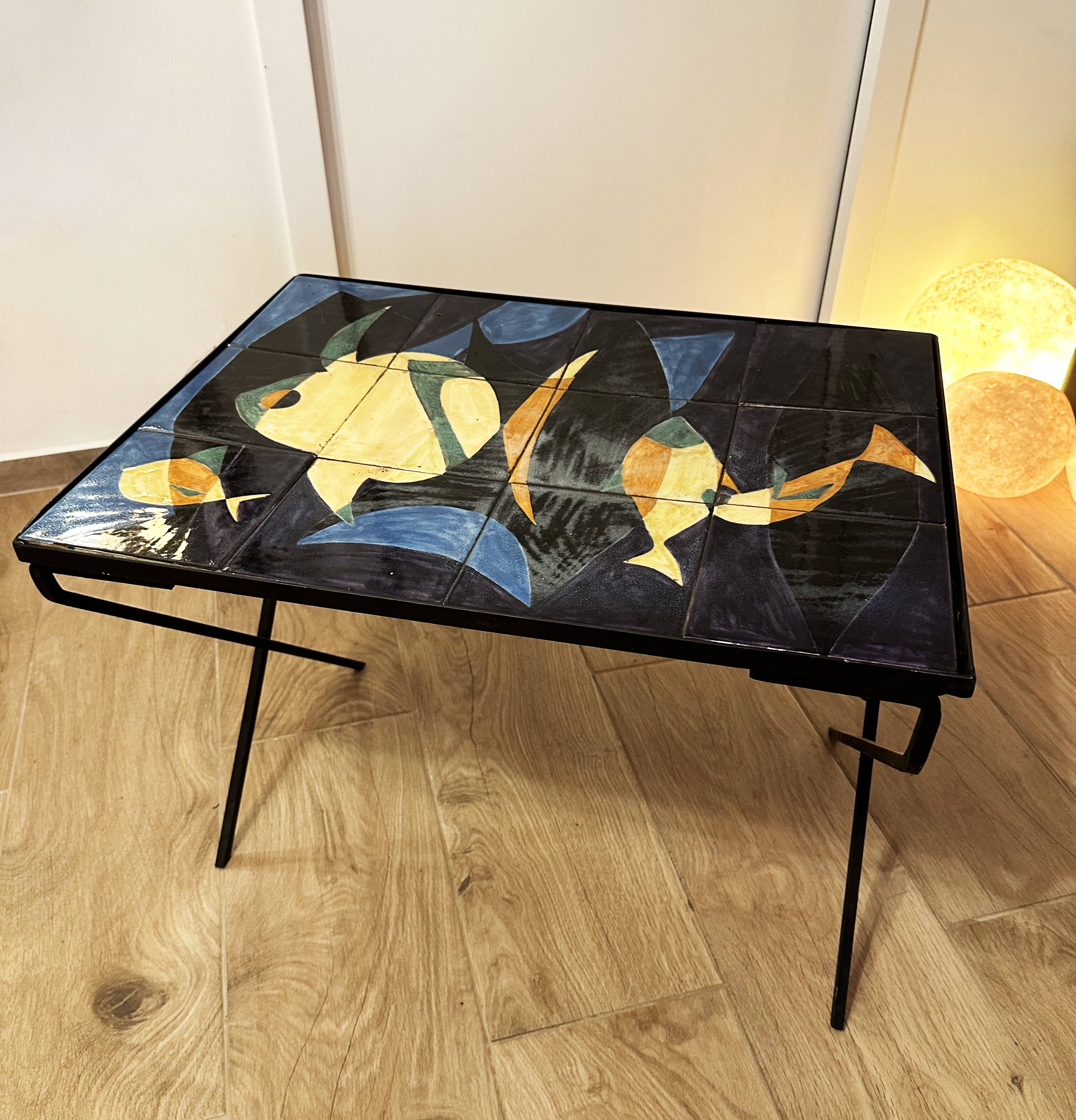 Coffee table with hand-painted ceramic top. France, 1950s