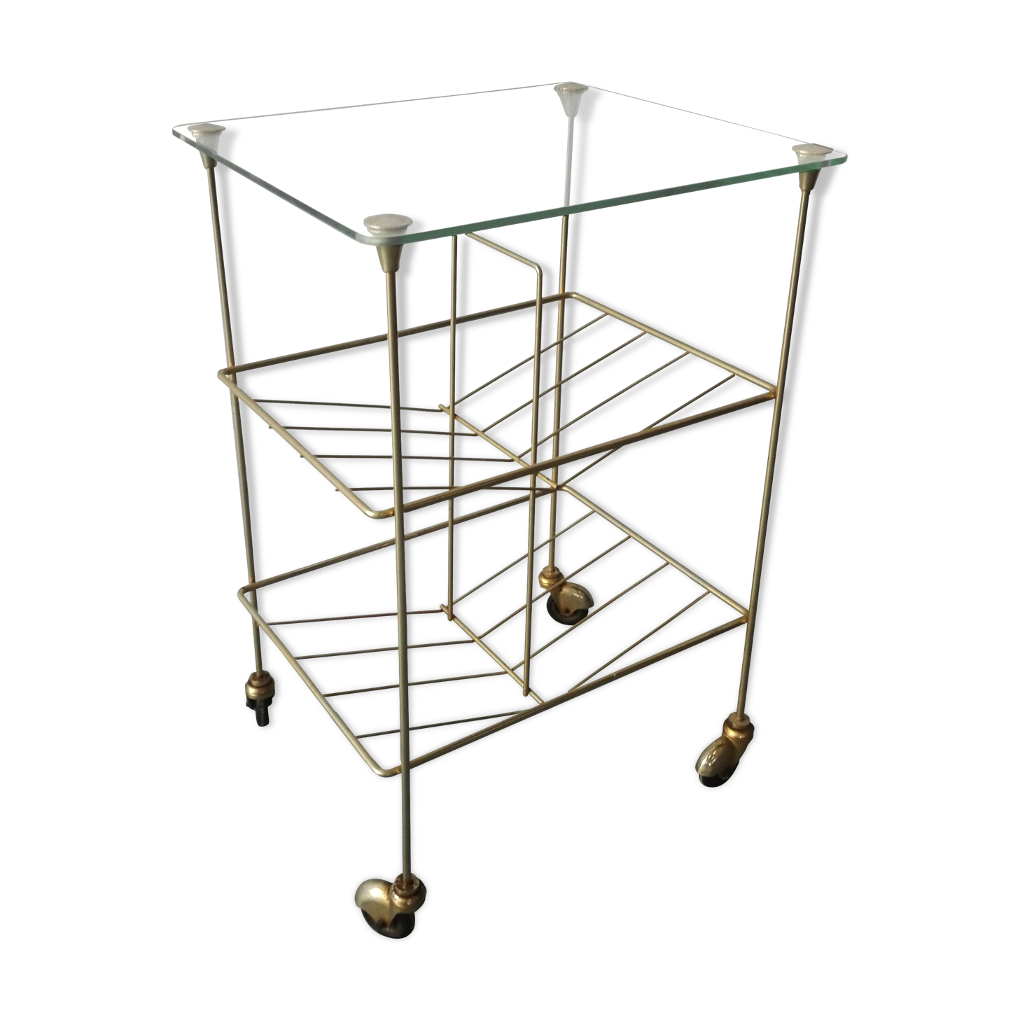 Brass and glass magazine door