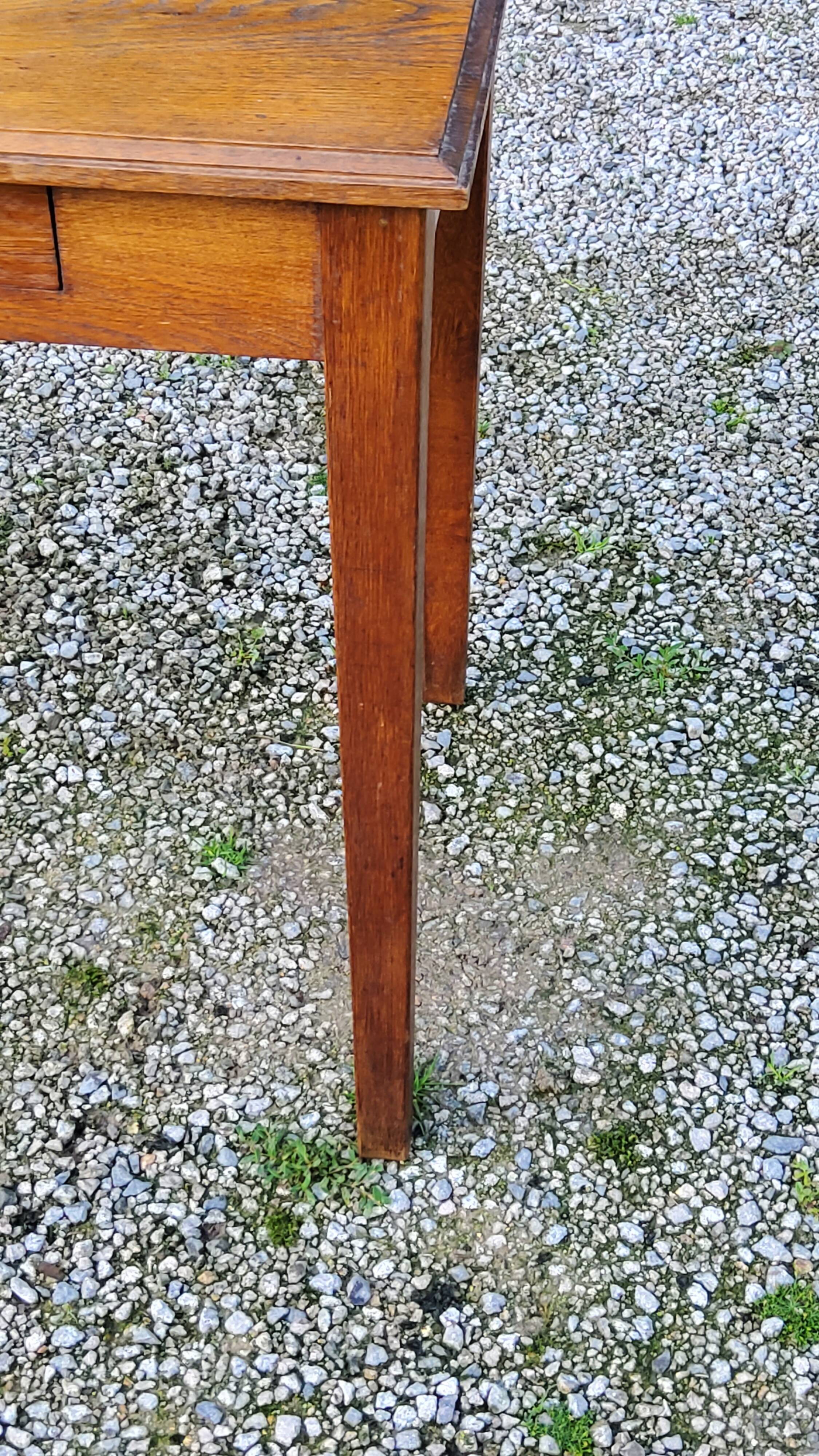 Oak writing table with spindle legs, early 20th century