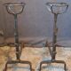Pair of fire dogs, bucket andirons from the 19th century.