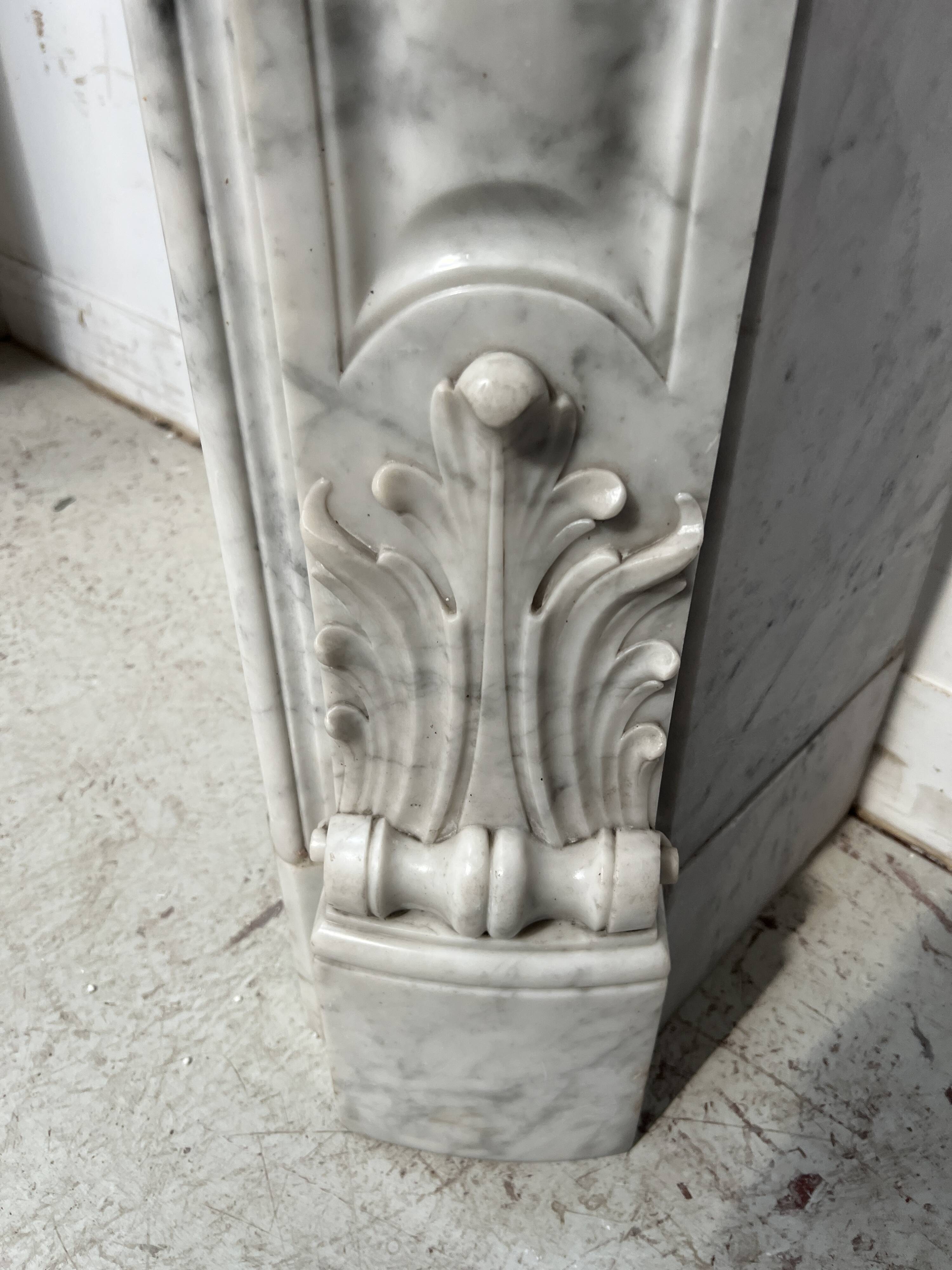 Louis XV style white Carrara marble fireplace, 19th century.