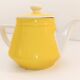 Théière Villeroy & Boch en porcelaine jaune et blanche