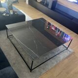 Coffee table with ceramic top and wrought iron base