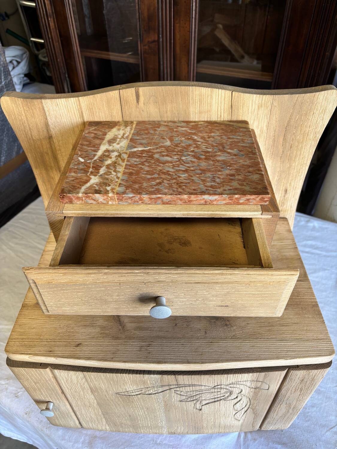 Raw wood bedside table