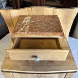 Raw wood bedside table