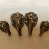 4 lion coat hooks in brass