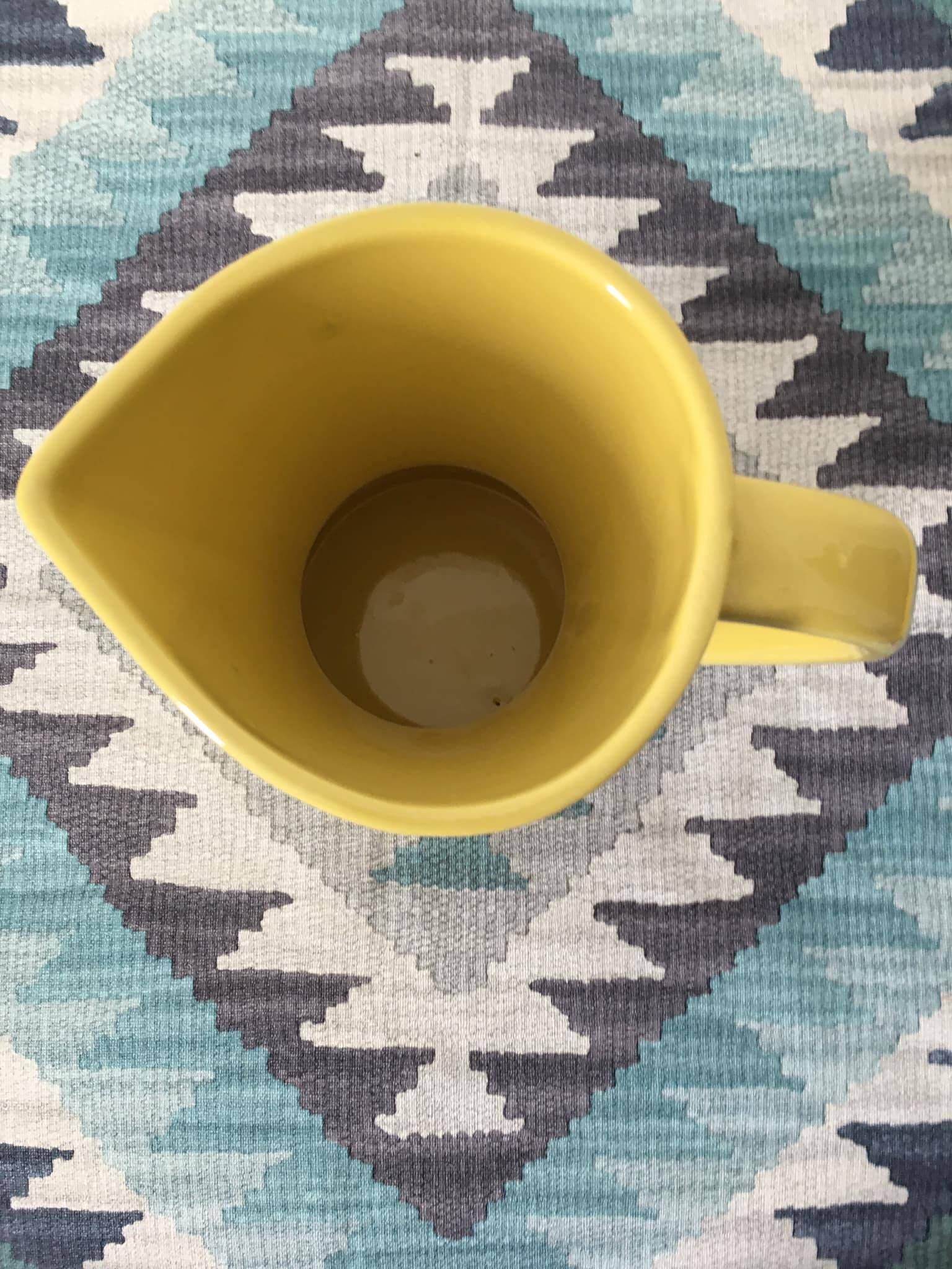 Pitcher or vase in yellow porcelain stamped Saint Clément France, numbered 7821