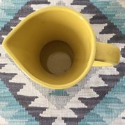 Pitcher or vase in yellow porcelain stamped Saint Clément France, numbered 7821