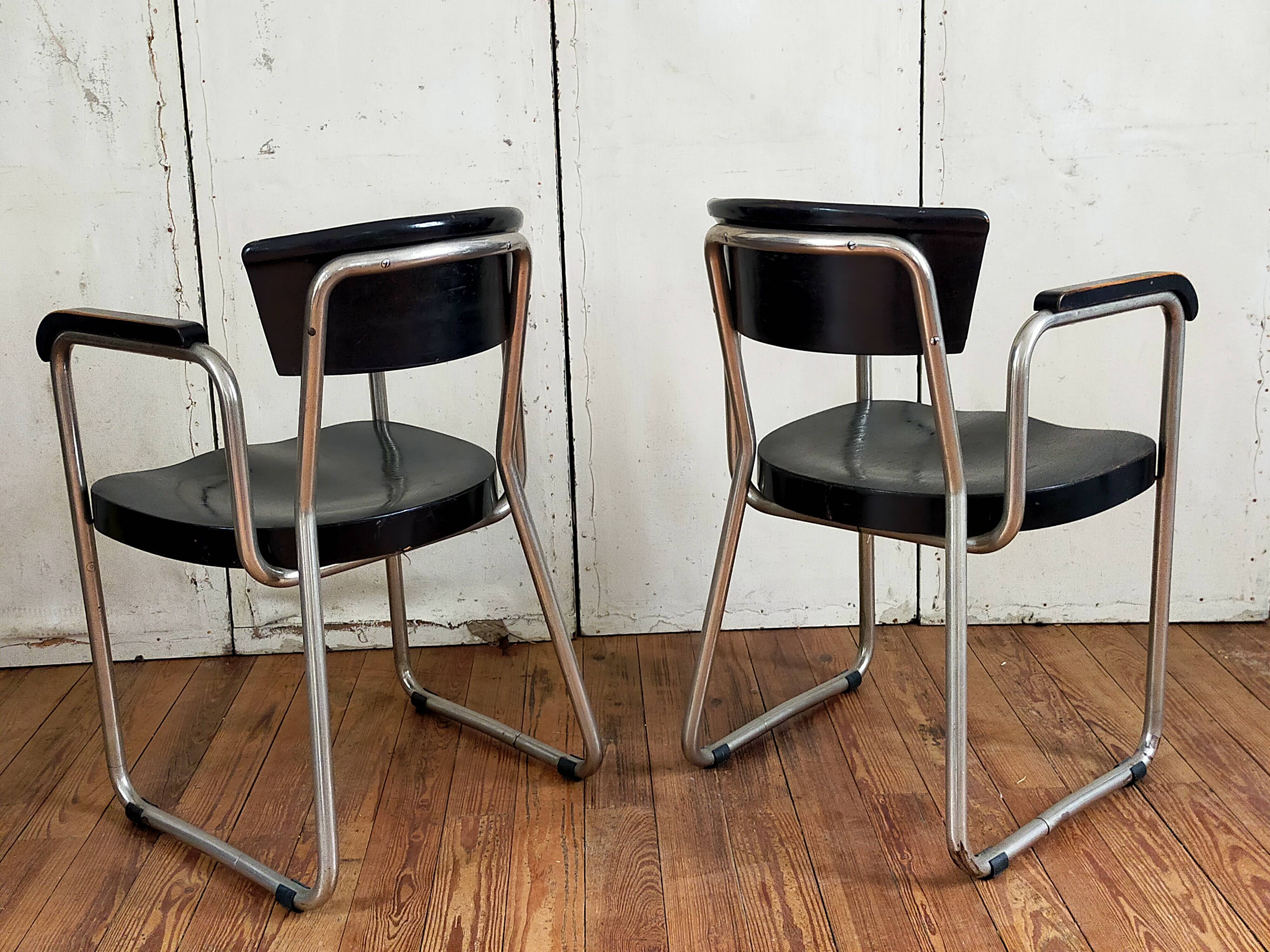 Pair of armchairs by Emile Guilhot edited by Thonet.