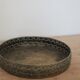 Round metal plate in patinated gold with an openwork border – D30 cm