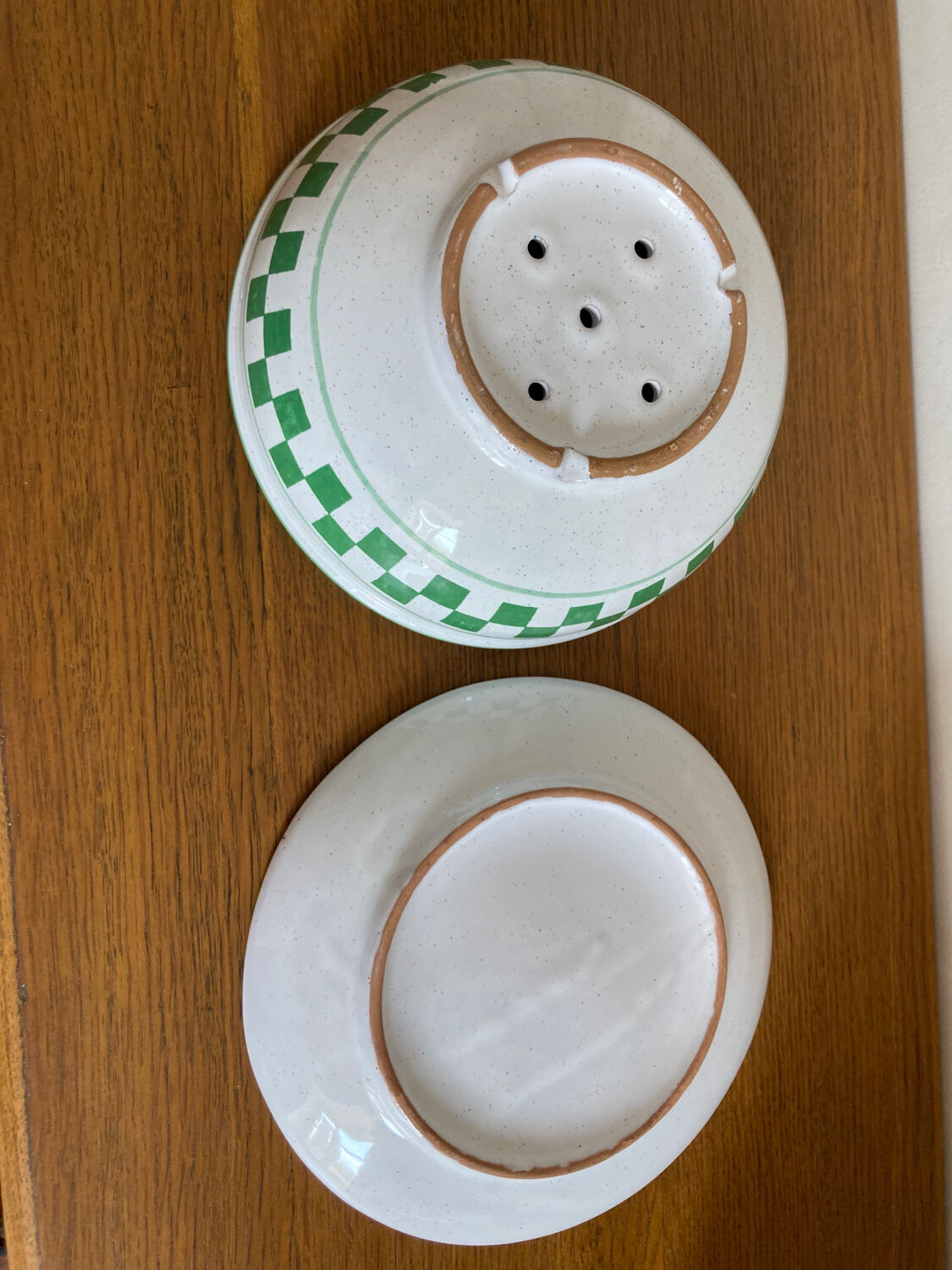 Glazed terracotta strainer and its cup