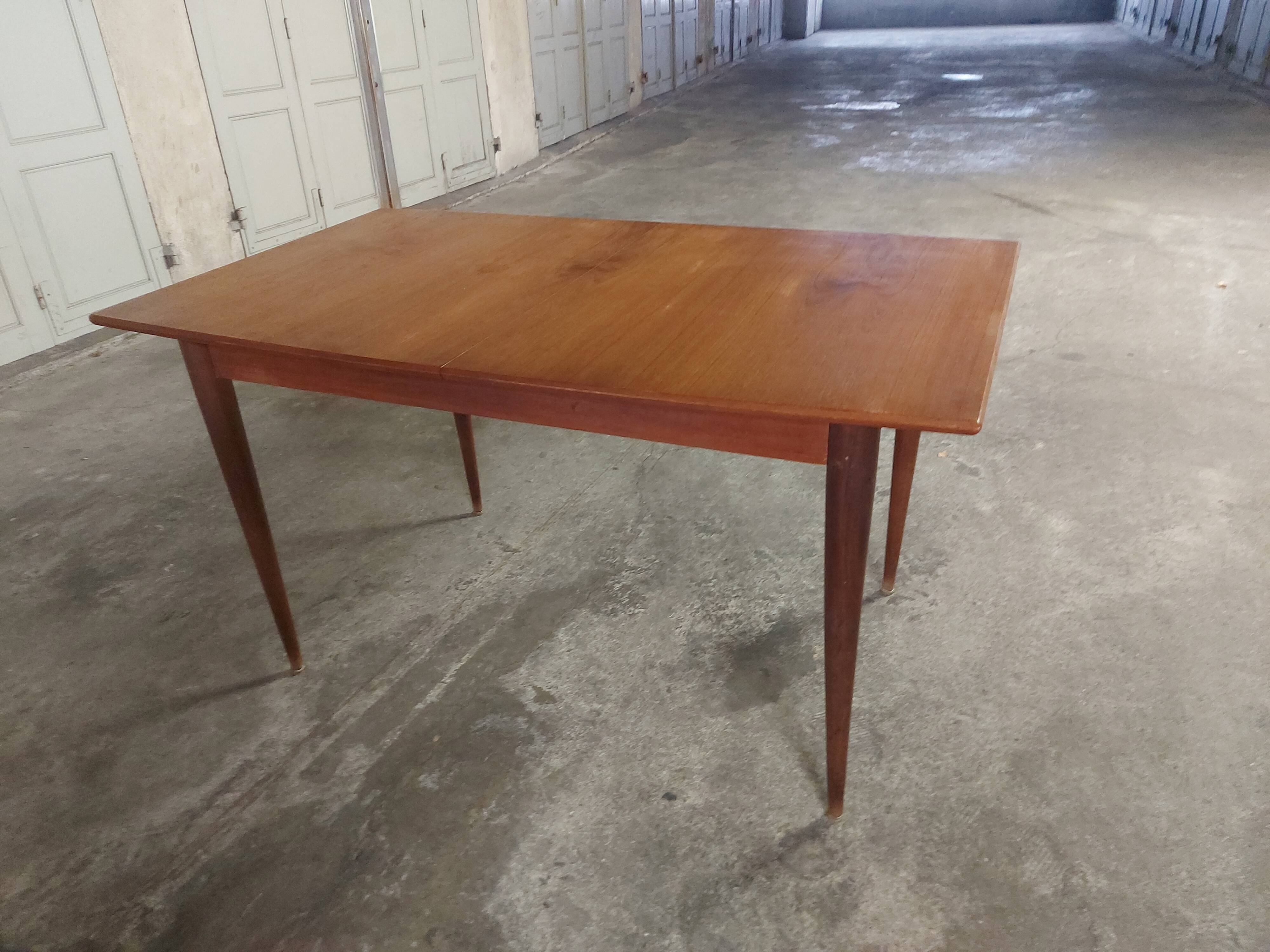 Scandinavian teak table with built-in extension