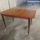 Scandinavian teak table with built-in extension