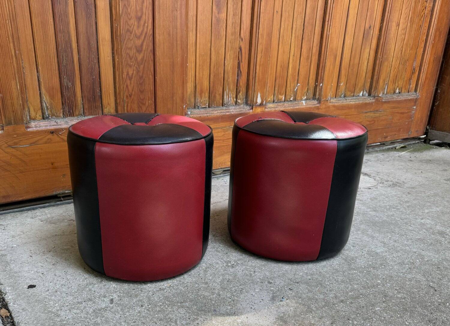 Set of 2 Mid-Century bordeaux and black ottomans in faux leather (upholstery fabric) - 1950s