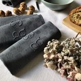 Suite of four napkins tinted in smoke grey