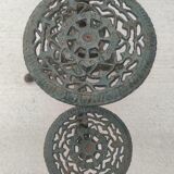 Old shelf carrying cast iron plants