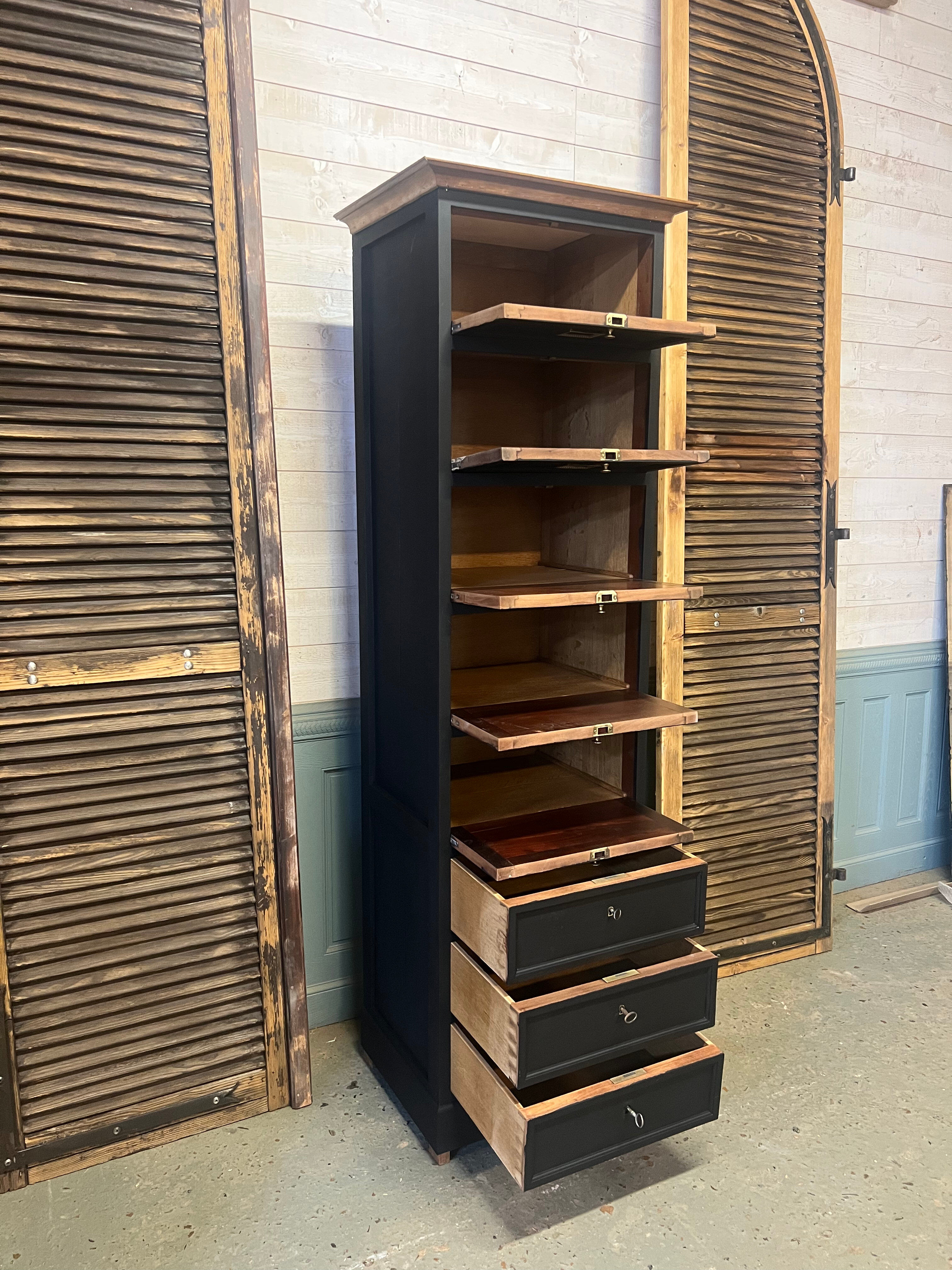 Cabinet with flaps and drawers