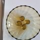 Art Deco plate in yellow glass