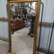 Miroir doré et biseauté