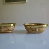 2 rattan/wicker and brass bowls/baskets