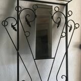 Wrought iron coat rack and shelf
