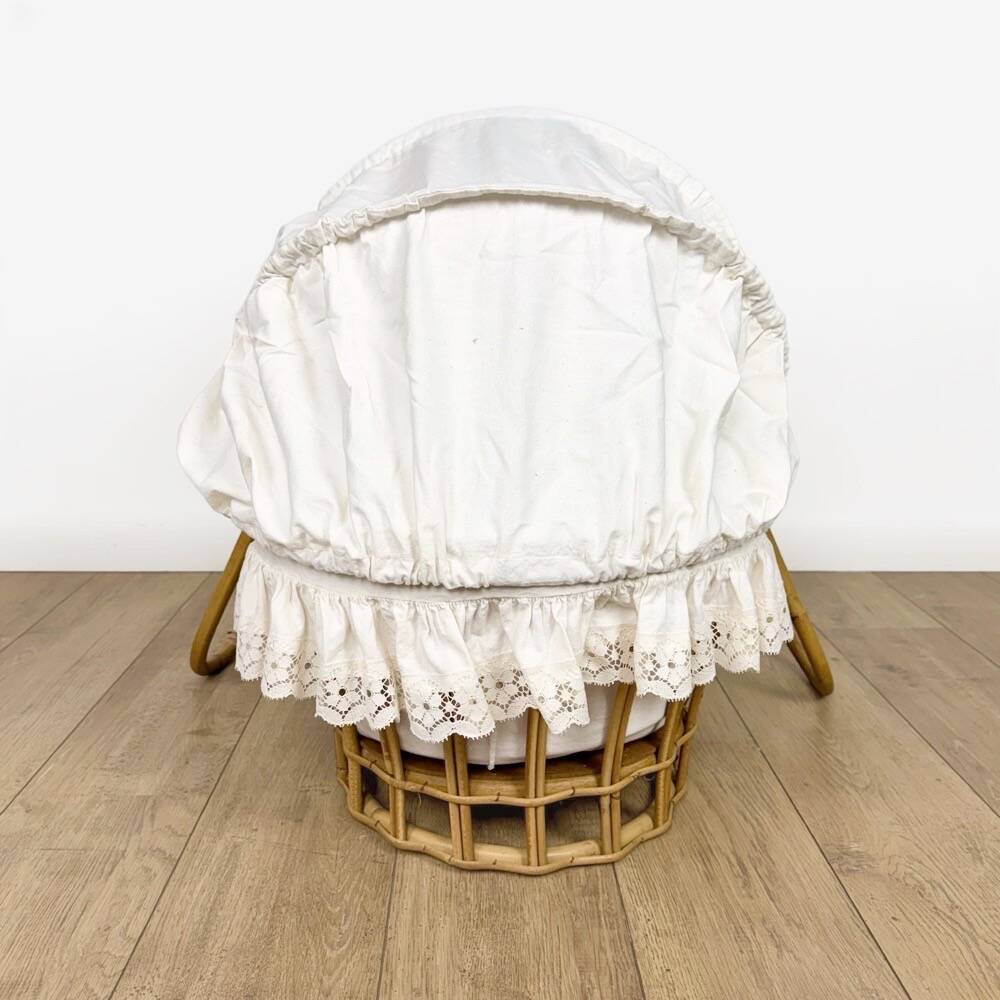 Bamboo bassinet on a stand, bohemian 1970s.