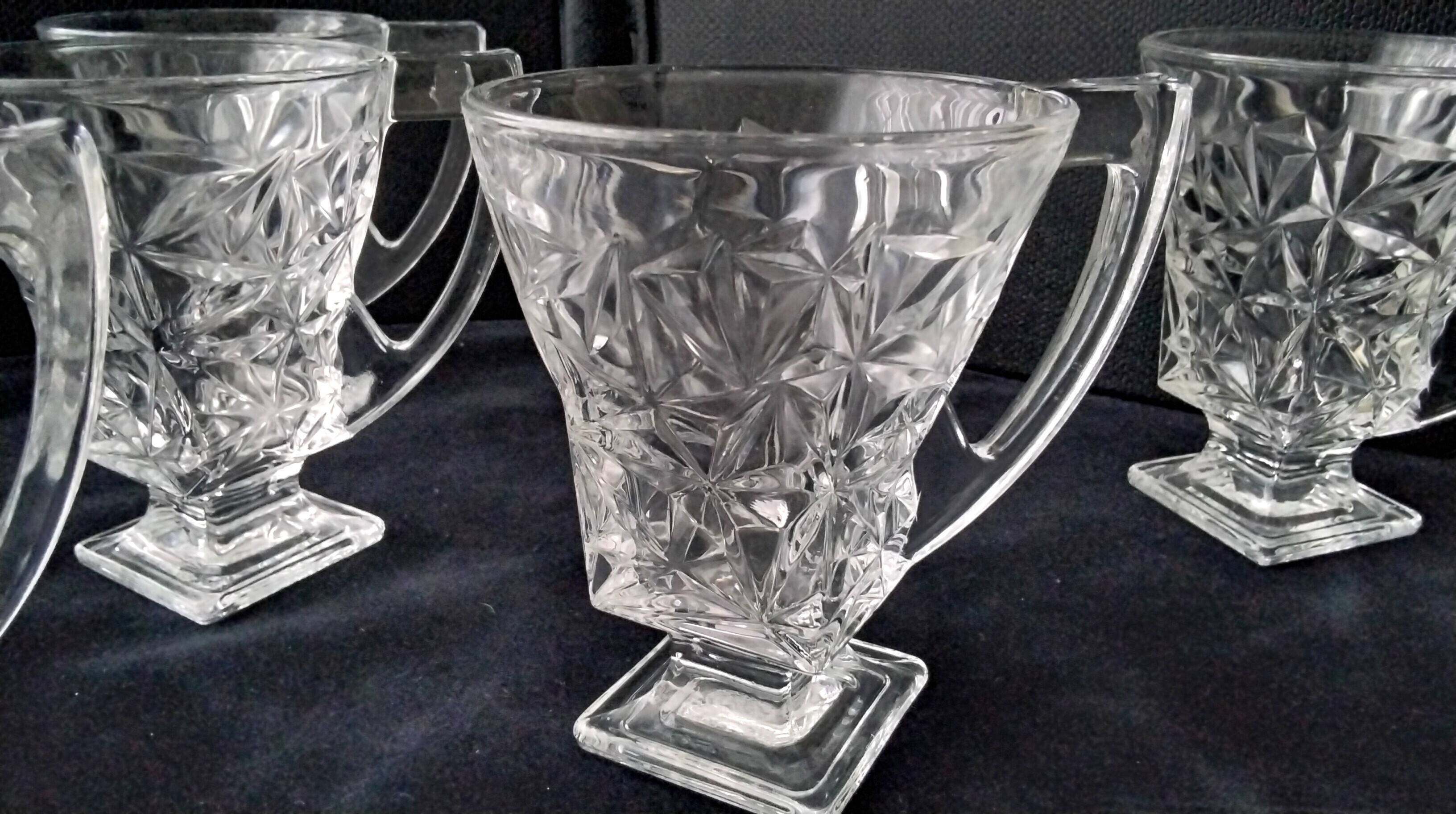 6 tea glasses with handles made of pressed moulded glass