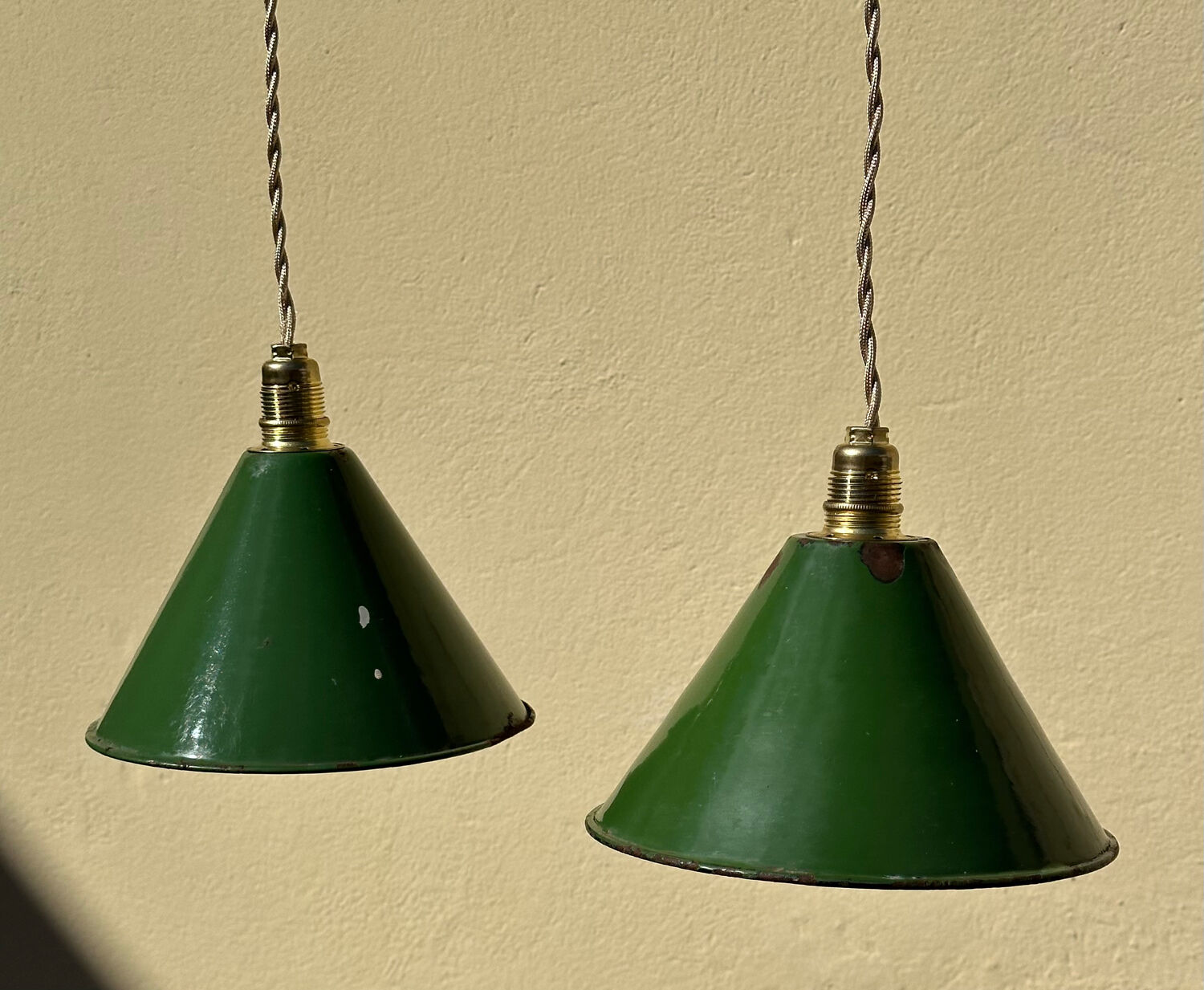 Pair of vintage industrial retro conical enamelled sheet metal pendant lights
